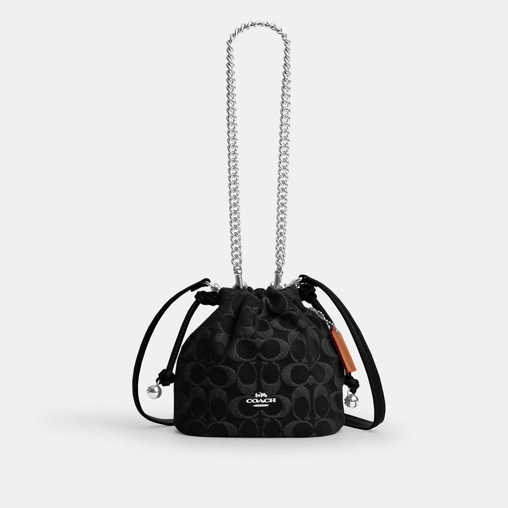 Coach Outlet Faye Mini Drawstring Bag In Signature Denim
